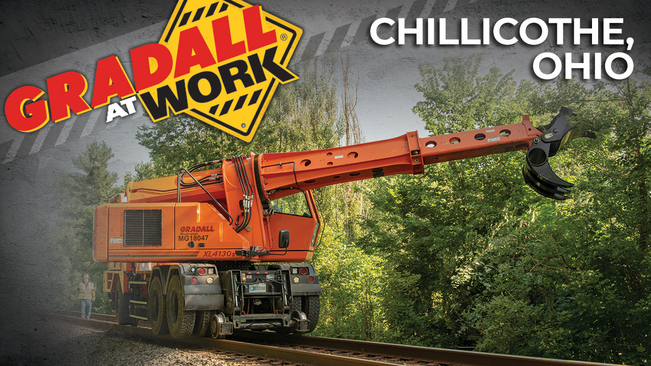 With grapple attachment, XL 4130 V handles MOW jobs efficiently